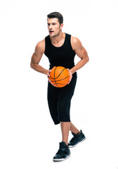 Poster - Full length portrait of a man playing in basketball