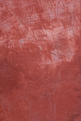 pattern on part of wall with red plaster