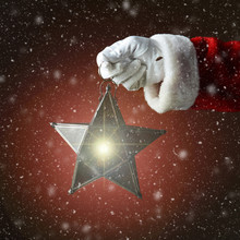 Santa Holding Star Lantern With Snow
