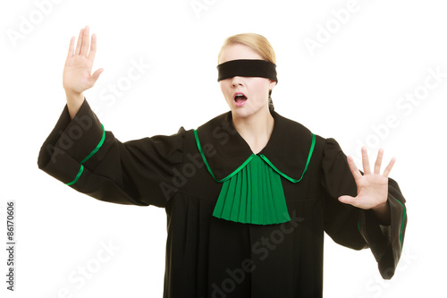 Fotografie, Obraz Blind justice. Woman covering eyes with blindfold