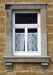 old window of a stone house