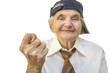 Elderly woman showing fig sign.
