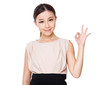© leungchopan - Young Businesswoman with ok sign gesture
