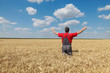 © sima - Agricultural scene, happy farmer in wheat field