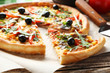 © 5second - Fresh tasty pizza on brown wooden background
