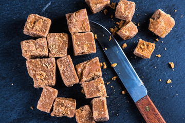 Wall Mural - Traditional homemade fudge toffee, cut in squares cubes