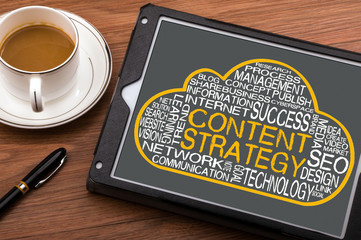 Wall Mural - content strategy word cloud on tablet pc