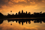 Fototapeta Krajobraz - Ancient temple Angkor Wat from across the lake. The largest religious monument in the world. Siem Reap, Cambodia