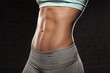 © Fresh Stock - Fitness female woman with muscular body, do her workout, abs, abdominals