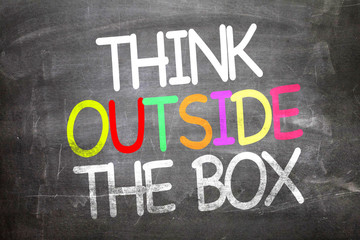 Wall Mural - Think Outside the Box written on a chalkboard