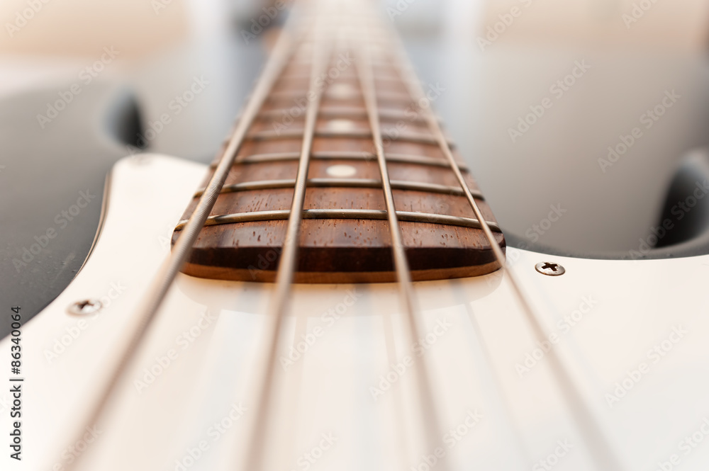 Classic black and white bass guitar body close up. color image - obrazy, fototapety, plakaty 