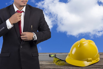 engineering man with white safety helmet standing in front of co