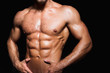 © sergiophoto - Muscular and sexy torso of young sporty man with perfect abs