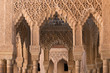 Moorish arches and columns of Alhambra harem in Granada, Spain
