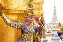 Giants Statue Under Golden Pagoda In Wat Pra Keaw
