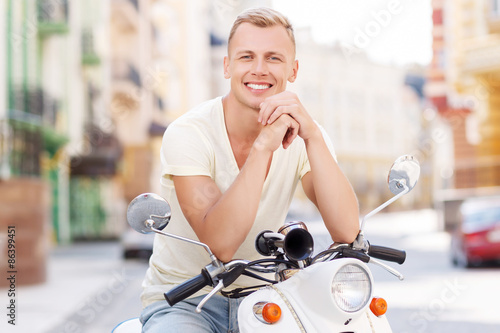 Blond Haired Man Leaning On Scooter Buy This Stock Photo And