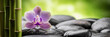 spa concept with zen stones basalt stone bamboo and orchid