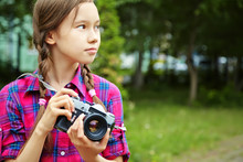 Girl With Photo Camera