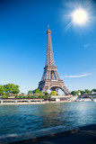 Fototapeta Boho - summer day the sun shines over the Eiffel Tower symbol of Paris.