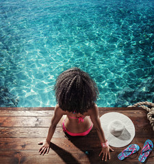 Sticker - Vacation. Summer. Woman relax in a hat near water pool
