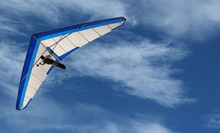 Hang Glider – Hang Glider Flying In The Sky On A Bright Blue Day