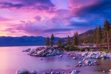 Wall Mural - Sunset over Lake Tahoe with stormy clouds over sierra nevada mountains, dramatic sky
