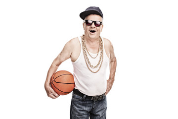 Poster - Cheerful senior in hip hop clothes holding a basketball