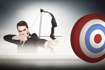 Sticker - Composite image of businessman practicing archery