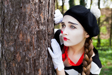 Emotional Mime on the park background