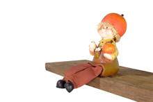 Little Baby With Orange Ceramic Figure