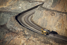Modern Gold Mine In Kalgoorlie, Western Australia. Large Truck Transports Gold Ore From The Super Pit, Open Cast Mine.