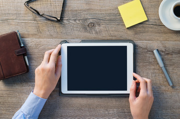 Businesswoman holding digital tablet