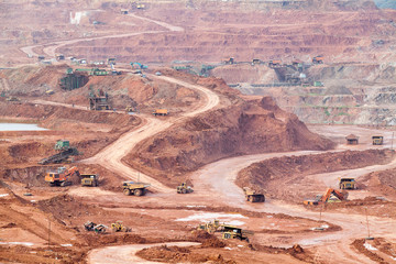 Part of a pit with big mining truck working