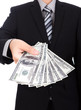 © jannoon028 - Business man Displaying a Spread of Dollar