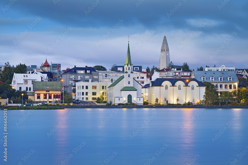 Obraz na płótnie Reykjavik, Iceland. Image of Reykjavik, capital city of Iceland, during twilight blue hour. w salonie
