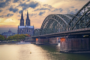 Cologne, Germany. Image of Cologne with Cologne Cathedral and Hohenzollern bridge across the Rhine River.