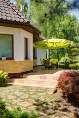 Wall Mural - Table and chairs under umbrella