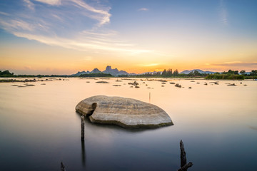 Canvas Print - Beautiful sunset landscape with seascape and stone