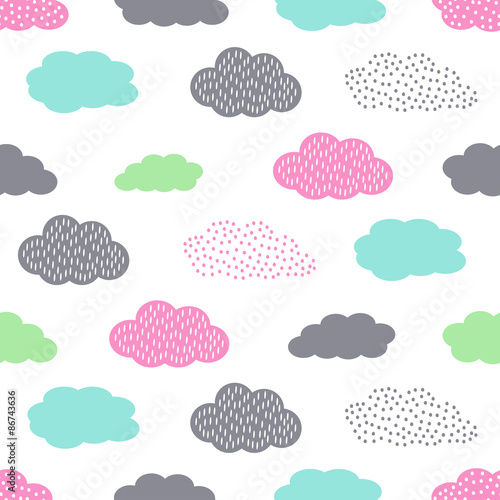 Fototapeta dla dzieci Colorful seamless pattern with clouds for kids holidays. Cute baby shower vector background. Child drawing style illustration.