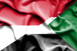 Waving flag of Sudan and Monaco