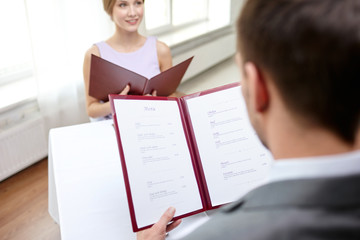 Sticker - close up of couple with menu at restaurant