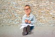© luismolinero - Little girl with glasses studing
