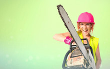 Worker Woman With Chainsaw Over White Background