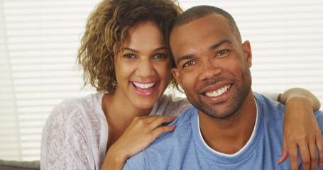 happy african american couple smiling