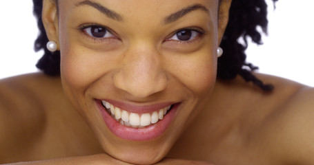 Sweet African woman showing off her pearly whites