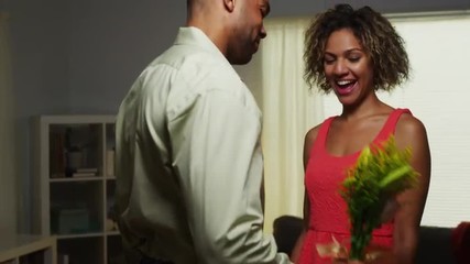 Wall Mural - Black boyfriend surprises girlfriend with flowers