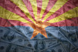 © luzitanija - colorful waving arizona state flag on a american dollar money background
