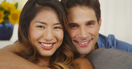 Wall Mural - Happy mixed race couple smiling