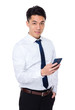 © leungchopan - Young businessman use of the mobile phone