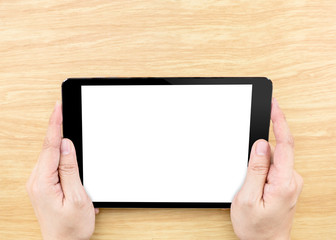 Wall Mural - hand holding tablet on table top,mock up for adding your design